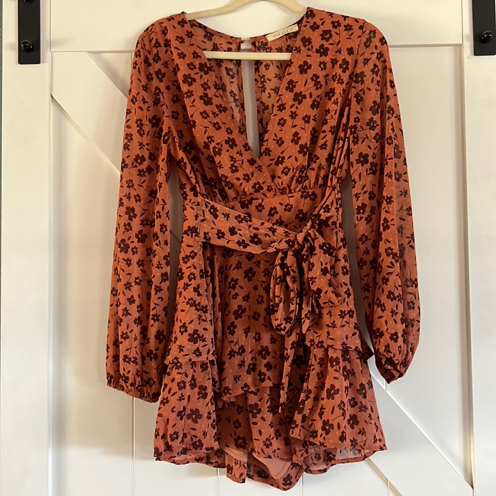 Romper open back size medium